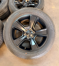 Load image into Gallery viewer, Set of Used 20" Matte Black '19-'26 RAM 1500 OEM Wheels 275/55R20 Bridgestone LT