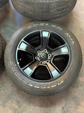 Load image into Gallery viewer, Set of Used '19-'25 RAM 1500 Black OEM Wheels on 275/55R20 Bridgestone Tires LT