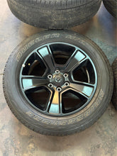 Load image into Gallery viewer, Set of Used '19-'25 RAM 1500 Black OEM Wheels on 275/55R20 Bridgestone Tires LT