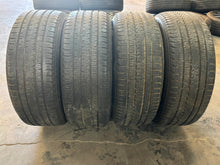 Load image into Gallery viewer, Set of Used '19-'25 RAM 1500 Black OEM Wheels on 275/55R20 Bridgestone Tires LT
