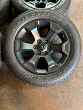Load image into Gallery viewer, Set of 4 Used OEM '19-'25 RAM 1500 Big Horn Black Wheels on 275/55R20 Tires LT