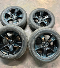 Load image into Gallery viewer, Set of Four Used 20" Black '19-'25 RAM 1500 Rims on 275/55R20 Bridgestone OWL LT