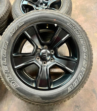Load image into Gallery viewer, Set of Four Used 20" Black '19-'25 RAM 1500 Rims on 275/55R20 Bridgestone OWL LT