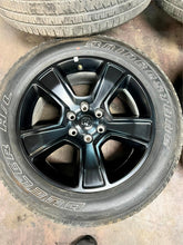 Load image into Gallery viewer, Set of Four Used 20" Black '19-'25 RAM 1500 Rims on 275/55R20 Bridgestone OWL LT
