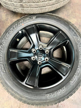 Load image into Gallery viewer, Set of Four Used 20" Black '19-'25 RAM 1500 Rims on 275/55R20 Bridgestone OWL LT