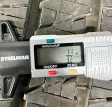 Load image into Gallery viewer, Set of Four Used 20" Black '19-'25 RAM 1500 Rims on 275/55R20 Bridgestone OWL LT