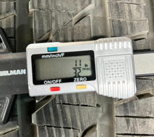 Load image into Gallery viewer, Set of Four Used 20" Black '19-'25 RAM 1500 Rims on 275/55R20 Bridgestone OWL LT