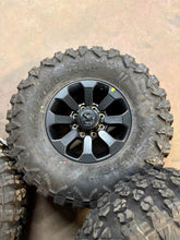 Load image into Gallery viewer, Set of 4 OEM 17" '05-'26 Dodge RAM 2500 3500 Black Rims 37/12.50R17 Yokohama XMT