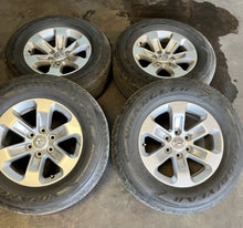 Load image into Gallery viewer, Set of 4 Used 18" Silver '19-'25 RAM 1500 Rims 275/65R18 Goodyear Fortitude LT