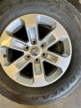 Load image into Gallery viewer, Set of 4 Used 18" Silver '19-'25 RAM 1500 Rims 275/65R18 Goodyear Fortitude LT