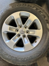 Load image into Gallery viewer, Set of 4 Used 18" Silver '19-'25 RAM 1500 Rims 275/65R18 Goodyear Fortitude LT