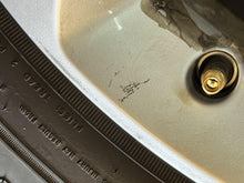 Load image into Gallery viewer, Set of 4 Used 18" Silver '19-'25 RAM 1500 Rims 275/65R18 Goodyear Fortitude LT