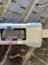 Load image into Gallery viewer, Set of 4 Used 18" Silver '19-'25 RAM 1500 Rims 275/65R18 Goodyear Fortitude LT