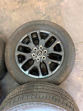 Load image into Gallery viewer, Set of 4 Used '22-'26 Toyota Tundra 20" Dark Grey Rims 265/60R20 Bridgestone LT