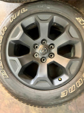 Load image into Gallery viewer, Set of Four OEM Black '19-'25 RAM 1500 Wheels 275/55R20 Bridgestone RWL Tires LT