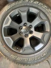 Load image into Gallery viewer, Set of Four OEM Black '19-'25 RAM 1500 Wheels 275/55R20 Bridgestone RWL Tires LT