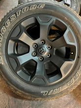 Load image into Gallery viewer, Set of 4 OEM Black '19-'25 RAM 1500 Wheels 275/55R20 Bridgestone Alenza Tires LT