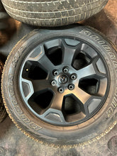 Load image into Gallery viewer, Set of 4 OEM Black '19-'25 RAM 1500 Wheels 275/55R20 Bridgestone Alenza Tires LT