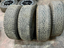 Load image into Gallery viewer, 20" Used Set of 4 '11-'25 GMC Sierra 2500 HD 3500 Rims 275/65R20 Goodyear AT LT