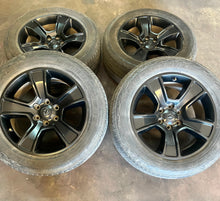 Load image into Gallery viewer, Set of Four Used 20" Black '19-'25 RAM 1500 Wheels 275/55R20 Bridgestone HL LT