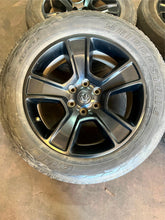 Load image into Gallery viewer, Set of Four Used 20" Black '19-'25 RAM 1500 Wheels 275/55R20 Bridgestone HL LT
