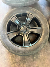 Load image into Gallery viewer, Set of Four Used 20" Black '19-'25 RAM 1500 Wheels 275/55R20 Bridgestone HL LT