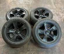 Load image into Gallery viewer, Set of Four Used 20" Black '19-'25 RAM 1500 Rims on 275/55R20 Bridgestone RWL LT