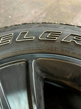 Load image into Gallery viewer, Set of Four Used 20" Black '19-'25 RAM 1500 Rims on 275/55R20 Bridgestone RWL LT