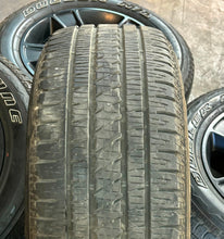 Load image into Gallery viewer, Set of Four Used 20" Black '19-'25 RAM 1500 Rims on 275/55R20 Bridgestone RWL LT
