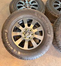 Load image into Gallery viewer, Set of 4 OEM Used '24-'26 Toyota Land Cruiser Wheels 265/70R18 Michelin Trail LT