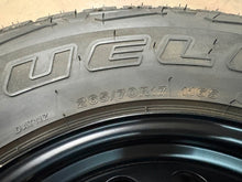 Load image into Gallery viewer, Single OEM '21-'26 Ford Bronco Black 17" Steel Wheel 265/70R17 Bridgestone Tire