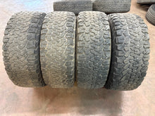Load image into Gallery viewer, Set of Used OEM '05-'26 Ford F150 Raptor Wheels on 315/70R17 BFGoodrich TAKO2 LT