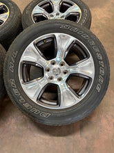 Load image into Gallery viewer, Set of 4 Used 2674 '19-'26 RAM 1500 Charcoal Polished Rims on 275/55R20 Tires LT