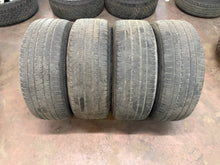 Load image into Gallery viewer, Set of 4 Used 2674 '19-'26 RAM 1500 Charcoal Polished Rims on 275/55R20 Tires LT