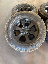 Load image into Gallery viewer, Set of Used '19-'26 RAM 1500 Black Rims 275/70R18 Goodyear Wrangler Duratrac LT