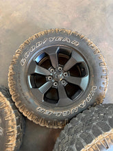 Load image into Gallery viewer, Set of Used '19-'26 RAM 1500 Black Rims 275/70R18 Goodyear Wrangler Duratrac LT