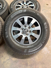 Load image into Gallery viewer, Set of Used '24-'26 Toyota Land Cruiser Charcoal Wheels on 265/70R18 Michelin LT