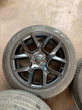 Load image into Gallery viewer, Set of 4 Used 22" Black '19-'26 RAM 1500 2725 Wheels 285/45R22 Pirelli Tires LT