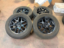 Load image into Gallery viewer, Set of 4 Used '05-'26 Ford F150 20" Black OEM Wheels 275/60R20 Hankook Tires LT