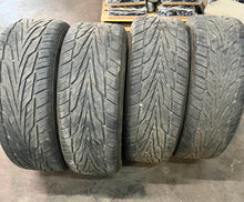 Load image into Gallery viewer, Set of Four Used 20" Black '19-'25 RAM 1500 Rims on 275/55R20 Toyo Proxes ST3 LT