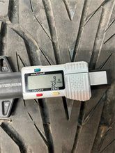 Load image into Gallery viewer, Set of Four Used 20" Black '19-'25 RAM 1500 Rims on 275/55R20 Toyo Proxes ST3 LT