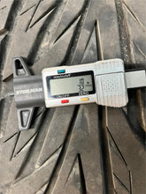 Load image into Gallery viewer, Set of Four Used 20" Black '19-'25 RAM 1500 Rims on 275/55R20 Toyo Proxes ST3 LT