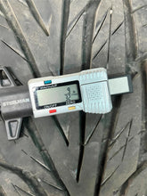 Load image into Gallery viewer, Set of Four Used 20" Black '19-'25 RAM 1500 Rims on 275/55R20 Toyo Proxes ST3 LT