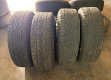 Load image into Gallery viewer, Set of Used OE '11-'25 GMC 2500 Denali Ultimate Rims 275/65R20 Goodyear Tires LT