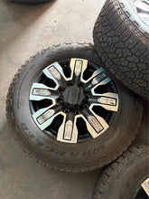 Load image into Gallery viewer, Set of Used OE '11-'25 GMC 2500 Denali Ultimate Rims 275/65R20 Goodyear LRE LT