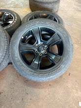 Load image into Gallery viewer, Set of Used Matte Black '19-'25 Dodge RAM 1500 Wheels 275/55R20 Bridgestone LT