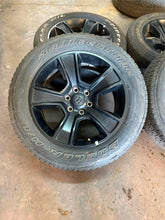 Load image into Gallery viewer, Set of Used Matte Black '19-'25 Dodge RAM 1500 Wheels 275/55R20 Bridgestone LT