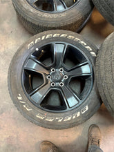 Load image into Gallery viewer, Set of Used Matte Black '19-'25 Dodge RAM 1500 Wheels 275/55R20 Bridgestone LT