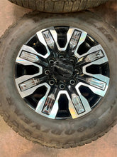 Load image into Gallery viewer, Set of 4 Used '11-'25 GMC 2500 Denali Ultimate Q7F Rims on 275/65R20 Goodyear LT