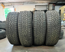 Load image into Gallery viewer, Set of 4 Used '11-'25 GMC 2500 Denali Ultimate Q7F Rims on 275/65R20 Goodyear LT